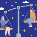 天秤に乗った女性二人